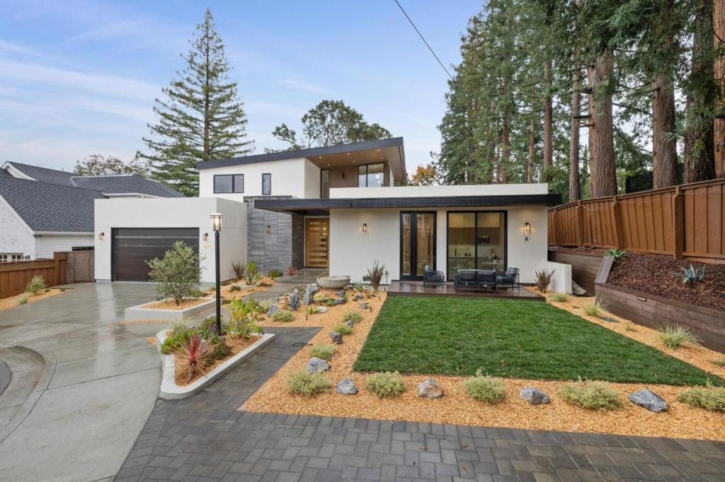 Just completed in 2025, this brand-new architectural masterpiece offers 5,050 sq. ft. of impeccable living space on a 10,500 sq. ft. lot in the highly coveted West Menlo Park. Designed for modern luxury and effortless functionality, this home blends sophistication with comfort, catering to the most discerning buyers. Featuring 5 spacious bedrooms and 6.5 elegantly designed baths, this residence ensures both privacy and opulence. The interior is adorned with top-of-the-line finishes, including state-of-the-art appliances, custom cabinetry, and full-height bathroom wall panels for a refined aesthetic. Adding to its versatility, a connected junior unit with a private kitchenette provides additional convenienceideal for guests, extended family, or an au-pair.Nestled at the end of a quiet cul-de-sac, surrounded by majestic redwood trees, this home offers a serene retreat while remaining walkable to restaurants and shops as well as schools wthin the the award-winning Las Lomitas School District.