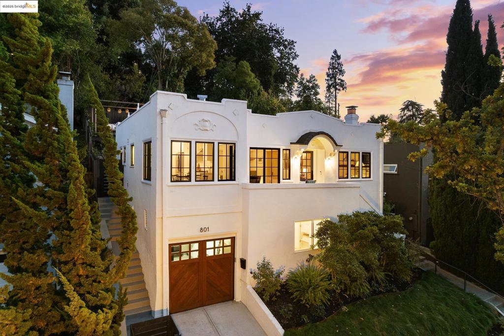 Charming Crocker Highlands Traditional just blocks from Lakeshore’s shops, restaurants & cafés. Elevated from the street and offering fabulous privacy, this move-in ready home enjoys natural light & rooftop vistas, plus Oakland City Views from the rear gardens. The chef’s kitchen features stone counters, tile backsplash, stainless steel appliances & a sunny breakfast room. Gracious formal living & dining rooms create an inviting flow, anchored by a cozy fireplace for the upcoming winter evenings. Downstairs offers a den, bedroom, sleek half bath & interior access to the garage, ideal separation of space for guests or office. Enjoy freshly landscaped rear gardens, complete with a Brazilian Ipe hardwood deck, outdoor kitchen, & dining patio, ideal for entertaining and play. Recent seller updates include all new Marvin windows on the main level, a 25-panel owned solar system (owned), new roof, electric heat pump for efficient heating & A/C, EV charger, & sewer lateral compliance. Ideally located near award-winning Crocker Highlands Elementary, Lake Merritt, the Grand Lake Farmers Market, and minutes from the Bay Bridge. A truly turnkey offering in one of Oakland’s most sought-after neighborhoods.
