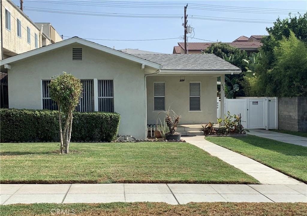This is a great opportunity to Lease a Home in Burbank above Glenoaks! This charming home offers fresh paint, new beautiful flooring, refinished hardwood floors, mini blinds, air conditioning and so much more. Great locale near shopping, dinning, schools and transportation. The 2 bedrooms are tandem, so one would be perfect as a home office. The cute kitchen includes stainless steel appliances (refrigerator, stove and microwave.) The ample laundry area has room for side-by-side units and includes a dryer, just bring your washer. The extra large living room offers a great view of the front yard. A cute dining room has a built-in hutch/bookshelves. There are ceiling fans in both bedrooms, dining room and kitchen. Enjoy your morning coffee or evening beverage on the quaint front porch. There's plenty of parking in the long driveway or under the carport. A patio area in the back is great to sit and relax. This rental is a separate front house and includes the front yard, driveway, patio and carport and there are two apartments in the back, that have a separate parking area. Landlord pays water and gardener, tenant pays all other utilities/services. Renter's Insurance will be required. Wonderful City of Burbank schools and services, while being close to major studios and easy freeway access to Downtown Los Angeles, the San Gabriel and San Fernando Valleys.