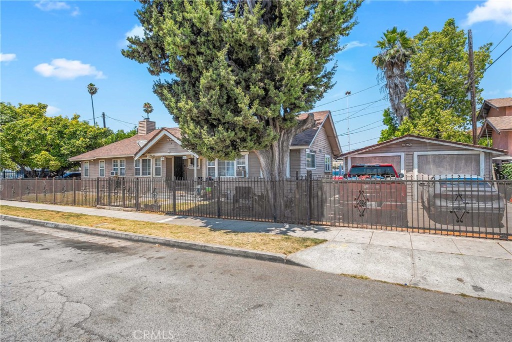 Discover an excellent investment opportunity in the heart of Los Angeles with this well-laid-out duplex featuring two separate units, each offering 2 bedrooms and 1 bathroom. With a total of 1,412 sq ft of living space, this income-producing property is ideal for an owner-occupant looking to offset their mortgage or a savvy investor seeking strong rental demand in a high-growth area. Sitting on a 4,758 sq ft lot, the property also includes a detached garage that provides off-street parking or the potential to be converted into an ADU for added income. Each unit has its own gas and electric meter, and there are laundry hookups available, making it easy to manage tenants and utilities. Located just minutes from major freeways, schools, and local amenities, this duplex offers a solid foundation with room to add value over time. Whether you're expanding your portfolio or getting started in real estate, this property delivers flexibility, potential, and location all in one.
