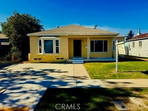 Photo of 1073 E Plymouth Street, Long Beach, CA 90805 (MLS # PW26127003)