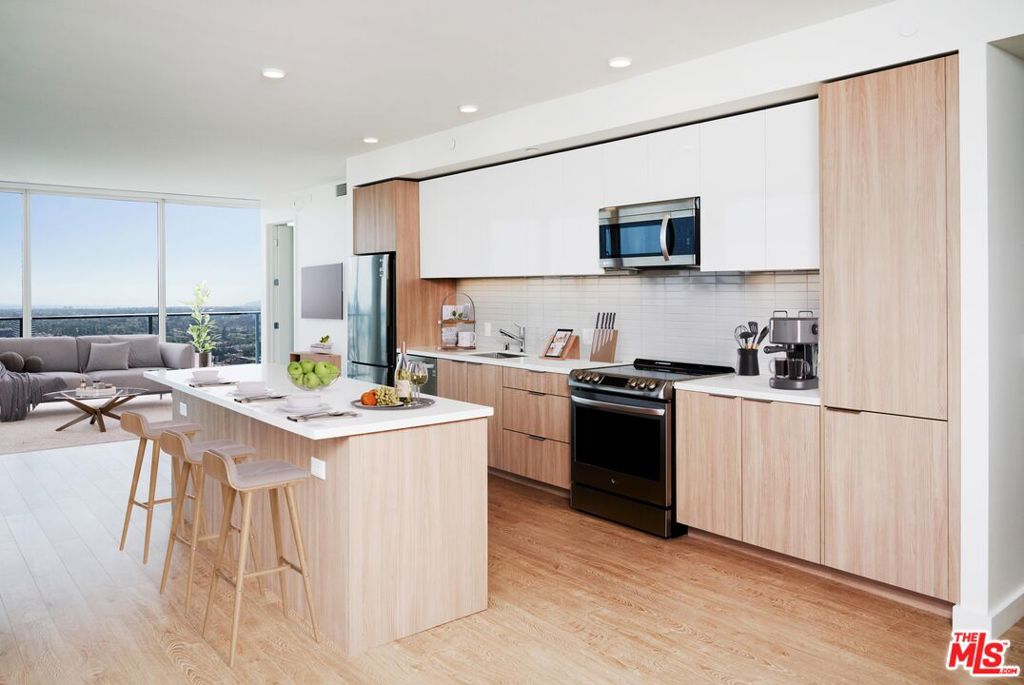 #1202 is a 1,387 SF corner 2BR/2BA residence with stunning SW ocean views. The Landmark Los Angeles is a dazzling 34 story residential tower offering sophisticated floor plans paired with unparalleled views and resort-inspired amenities. Living at The Landmark, residents will experience the unique indoor/ outdoor lifestyle for which Los Angeles is known. Enjoy the view from your expansive balcony where you'll bask in the spectacular ocean and mountain views accompanied by the cool ocean breeze. Get into the best shape of your life in the professional fitness center or swim laps in the Junior Olympic size pool. For the days when all you want to do is kick back and relax, you'll appreciate the chaise lounges and umbrellas surrounding the heated pool and spa, the club room, plush resident lounges and on-site cafe fronting a beautifully landscaped one acre park. The Landmark Los Angeles offers the sophisticated and unparalleled resort-inspired living experience you've dreamed about. Our stylish and modern apartment residences offer, floor to ceiling windows with patio access from both bedroom and living rooms, gourmet kitchens with custom Italian cabinetry and state-of the-art, energy efficient appliances, premium wood-style plank flooring, walk-in closets with custom shelving, in-unit washer and dryer, rolling window shades, and so much more. *Pictures and virtual tours are of similar but not exact unit*