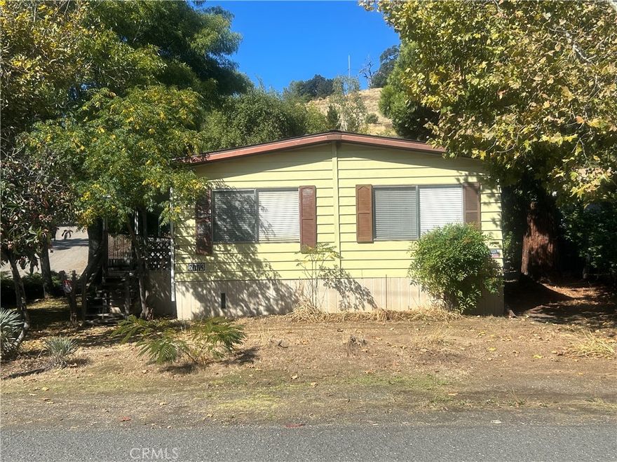 Welcome to your serene retreat in the heart of Nice, CA! This charming 2-bedroom, 2-bath manufactured home offers a seamless blend of comfort and convenience. Step inside to discover an inviting living room adorned with a cozy fireplace, perfect for unwinding on crisp evenings. The open floor plan effortlessly connects the living space with a spacious kitchen



Each bedroom provides ample space and privacy, while the master suite boasts its own en-suite bath for added luxury. Outside, you’ll find generous RV parking



The property also features abundant storage solutions, ensuring that everything from seasonal decorations to outdoor gear is neatly stowed away. Situated in the picturesque town of Nice, you're never far from spectacular views of Clear Lake and local amenities.