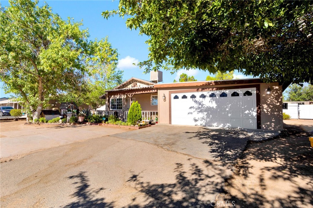 NESTLED IN THE HEART OF HESPERIA, This cozy 3-bedroom 2-bath home awaits your personal touch!! With nearly an acre of land and a spacious detached garage this property offers ample space for all your toys. Its prime location provides easy access to nearby shopping malls, stores, freeways, dining and much more. Don't miss the opportunity to make this charming house your new home!!!