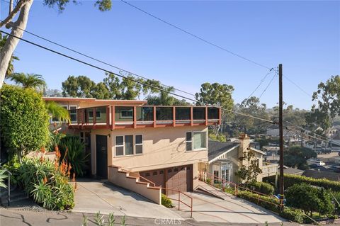 Photo of 114 HIGH DRIVE Dr, Laguna Beach, CA 92651 (MLS # LG25264390)