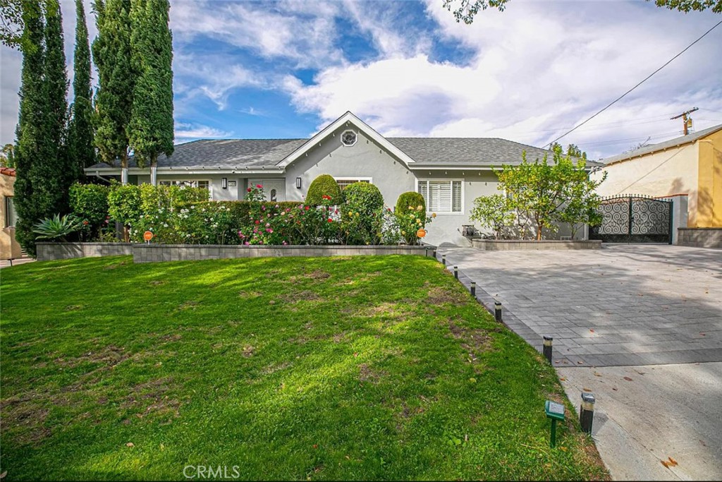 Located in a desirable Glendale neighborhood, this remodeled home offers a blend of timeless charm and modern design. The main house includes 4 bedrooms and 3 bathrooms, featuring an open floor plan, recessed lighting, and updated flooring throughout. Inside, you will find a gourmet kitchen designed for both comfort and entertaining, with ample storage and tasteful finishes. The living spaces are filled with natural light, creating a warm and inviting atmosphere. The backyard offers a private retreat with a built-in barbecue area, perfect for gatherings or quiet evenings. The front house has exclusive use of the backyard and two driveway parking spaces. The ADU has its own entrance for added privacy. This is a rare opportunity to enjoy a beautiful, versatile property in a prime Glendale location.