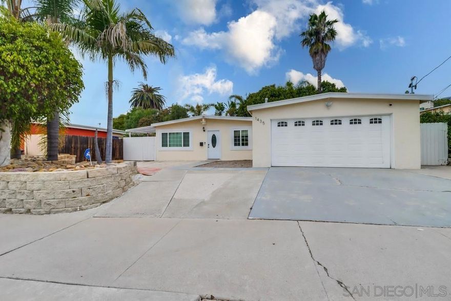 It's finally here! This is the best priced, Beautifully REMODELED, 4 bedroom, 2 bath home with CENTRAL AC and 2 car garage in Spring Valley! All on one level, this home features remodeled kitchen with QUARTZ counters, newer floors & stainless steel appliances, Living Room and Family or Dining Room. Your spacious primary bedroom features a cozy FIREPLACE, and bathroom with DUAL SINK vanity and STEP-INTO Shower. The other 3 bedrooms are located on the other side of the home with a bathroom featuring soaking tub with shower. Your low maintenance yard wraps around the home with plenty of room for outdoor living space, perfect for entertaining. Air Conditioning was new in 2019. Attached 2 car garage features full sized laundry. solar panel LEASE system!