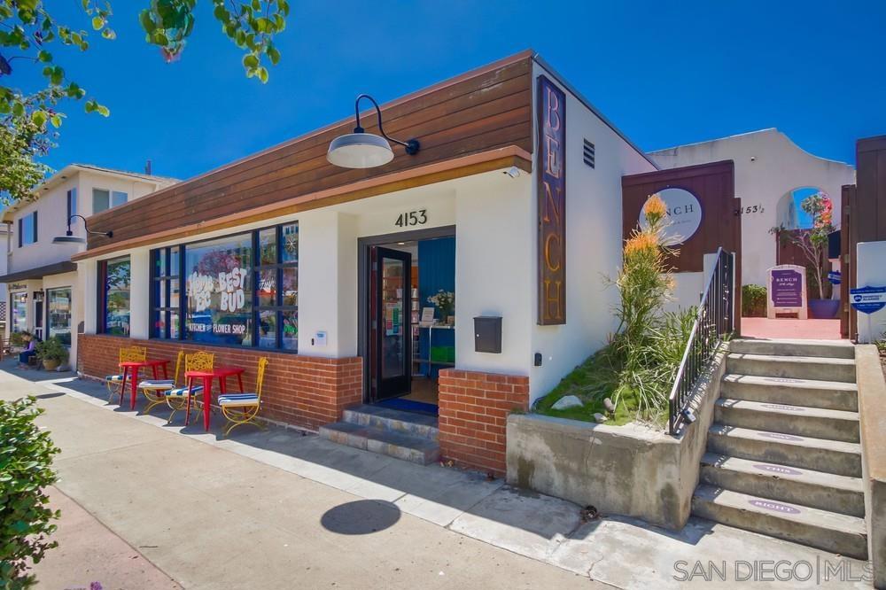 Rare Mixed-Use Gem in the heart of Kensington Village! Don't miss this unique opportunity to own a beautifully maintained mixed-use property in one of San Diego's most charming neighborhoods. The residential portion features a charming Spanish style home with timeless character-hardwood floors, custom tile and a cozy fireplace. Enjoy the private yard, a one-car garage, separate and spacious storage room, and TWO additional parking spaces accessed via the alley-an uncommon find in this coveted area! Attached to the home is a versatile commercial storefront (approx. 650 sq ft), ideal for a boutique business or income generating tenant. Offering excellent visibility and foot traffic, this mixed-use property offers a rare chance to live, work, or invest in the heart of Kensington.