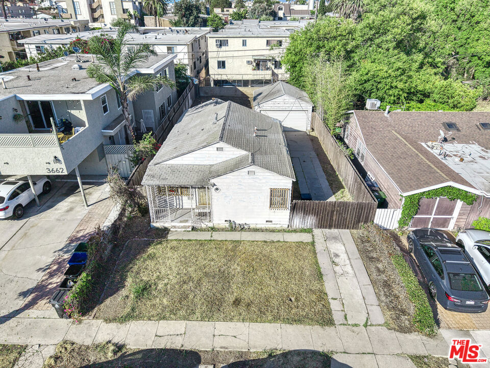 Calling All Developers, Investors, and Visionaries! Welcome to 3664 Kelton Ave, a rare R2-zoned opportunity in the heart of Palms - one of LA's fastest-growing neighborhoods. This centrally located, mid-block traditional-style home sits on a generous lot and offers multiple paths to unlock serious value: (a) Rehab the existing structure, enhancing or expanding upon the current 2-bedroom, 1-bath layout. Whether you restore its charm or add square footage, there's plenty of potential to create a comfortable and stylish home with character, (b) Start fresh and bring your own vision to life. On this R2 lot, you can maximize buildable square footage to well over 4,000 SF, offering flexibility for a new construction single-family home, duplex, or more - perfect for those seeking to customize their home or maximize long-term value, (c) Move forward with the seller's existing plans, already submitted to the city, for a brand-new 4,200 SF residence plus 215 SF garage, featuring a front and rear home + attached JADU. Estimated ARV (after-repair value) is $3.2M, which pencils out to just $760/SF for new construction in a thriving Westside submarket. Whether you're a builder, developer, flipper or end-user, this is your chance to enter a prime location with multiple upside strategies at a low cost basis. With its R2 zoning, deep lot, and development momentum already underway, 3664 Kelton Ave is a canvas ready to meet the moment.