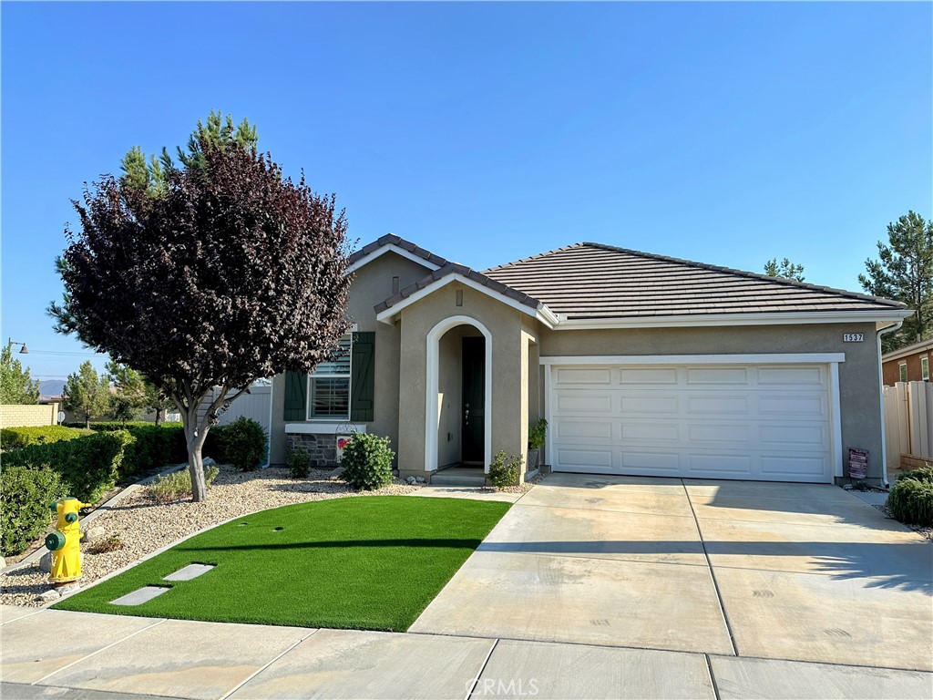 Pride of ownership! This well-maintained corner lot home in K. Hovnanian’s Four Seasons gated community offers resort-style living for 55+ & better! The “Sanctuary” floor plan presents stunning single story homes in beautiful Beaumont, CA featuring 2 bedrooms, 2 bathrooms, a den, an intimate family room, grand open kitchen, dining nook, and 2-car attached garage (with an EV Fast Charger). A multitude of windows with shutters allow for plenty of natural light throughout the day. The spacious kitchen is great for entertaining with large granite countertops, stainless steel appliances, and a huge walk-in pantry. The primary suite features a modern layout and large walk-in closet. Both bedrooms equipped with ceiling fans and carpeted flooring lend coziness and comfort. Magical evening sunsets can be enjoyed from the private backyard oasis, boasting a tranquil pond with greenery and fantastic views of mountains. Enjoy the luxurious community amenities, including one inside and two outside pools, tennis and pickleball courts, fitness centers, walking trails, ballroom, bistro, theater room, billiard tables, salon, numerous classes, clubs, events, activities, and much more! Don't miss out, take a look at this one today!