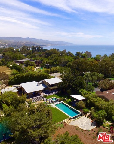 A Point Dume beauty that blends West and East Coast together, perfectly. A naturally modern take on a traditional craftsman with Little Dume beach access. This house is immaculate, gracious in size and has an outdoor area that is romantic and soulful. The entire property is incredibly private and the outdoor space was created for entertaining. The landscaped grounds have been expertly curated integrating the pool and decks thoughtfully. Teak floors and expansive decks throughout. High end everything, ceilings that soar and views that are private and beautiful.
