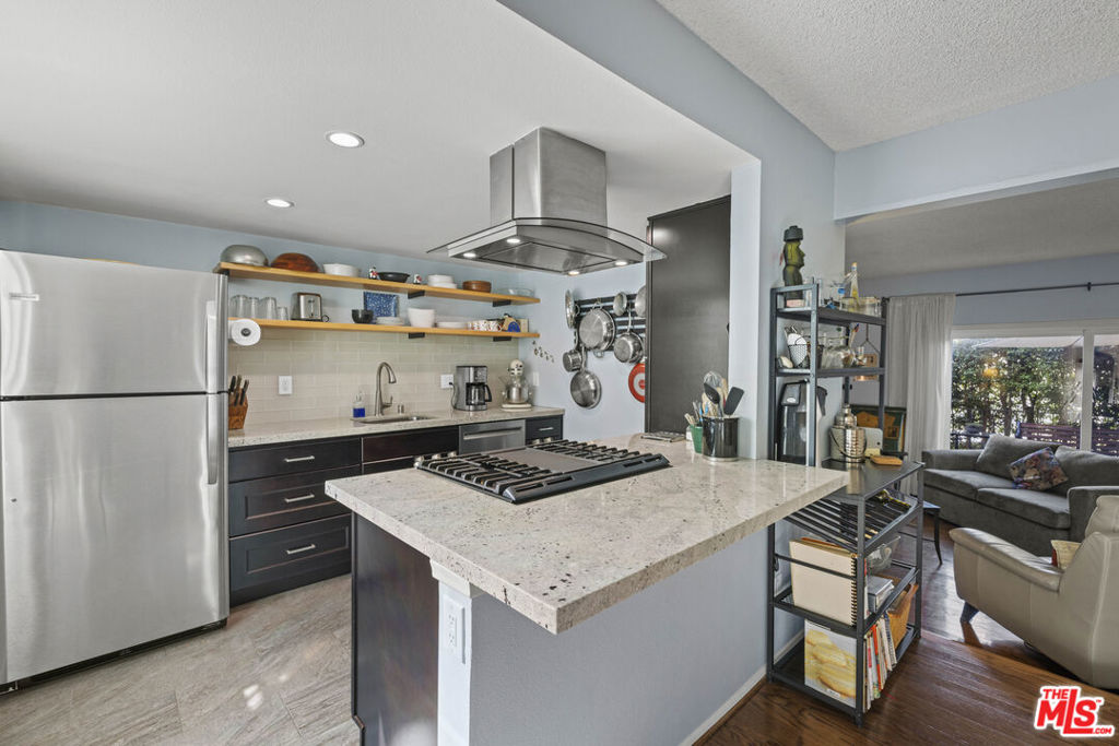 Step into a bright and airy townhome where coastal charm meets modern elegance. As you enter, you'll immediately feel the ocean breezes flowing through every room. The open layout extends across the newly renovated floors, creating an inviting space that feels both fresh and timeless.The heart of the home lies in the beautifully remodeled kitchen, where sleek finishes meet functional design. Upstairs, two spacious en suite bedrooms with soaring ceilings offer tranquility and privacy. The primary suite stands out with its extensively remodeled bathroom designed with spa-like finishes you rarely find in Redondo Beach townhomes. Whether you're hosting guests or enjoying a quiet evening, the private patio surrounded by lush hedges is the perfect spot for BBQs, morning coffee, or unwinding after a busy day. Another unique feature: a private, attached two-car garage that offers the rare combination of convenience and security. With low HOA fees and a well-maintained complex, this home checks all the boxes. Just a short stroll from award-winning schools, parks, shopping, dining, and the beach, the location couldn't be more ideal. Picture weekend strolls to Dale Page Park or grabbing a bite at local favorite, Panelas. This stylish, turnkey gem in the heart of Redondo Beach is more than just a home it's a cosmopolitan beach lifestyle waiting to be embraced. Don't miss out!