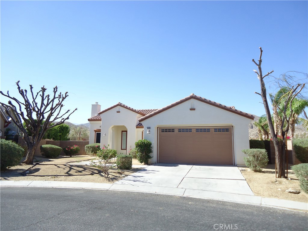 Beautifully updated single-story home located in a gated community in Desert Hot Springs. This move-in ready property features fresh interior paint, an open and spacious floor plan, and numerous upgrades throughout. The large living room offers a cozy fireplace and flows seamlessly into the modern kitchen, which includes an upgraded granite center island, There a pantry, and abundant cabinet space. The home comes equipped with brand-new stainless steel appliances, including a double-door refrigerator, stove, dishwasher, and microwave. The generous primary suite includes its own fireplace, a walk-in closet, dual-sink vanity, and a walk-in shower also there is a flexible space you can use as an office or entertainment. Two additional well-sized bedrooms. Additional highlights include an indoor laundry room with cabinetry, a large attached garage, and a spacious backyard with a opened patio—perfect for outdoor gatherings and relaxation. Located in a quiet, well-maintained community, this home offers comfort, style, and convenience. A must-see!