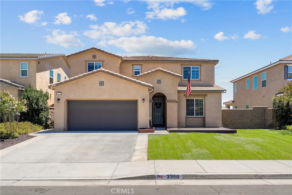 Stunning home nestled in the heart of Spencer’s Crossing, one of Murrieta’s most desirable master-planned communities. This spacious 2,500 sq. ft. beauty offers the perfect blend of style, comfort, and functionality—with PAID solar to sweeten the deal! Step inside and you’re immediately greeted by soaring ceilings and an open-concept layout that radiates warmth and elegance. The bright, modern kitchen features granite countertops, ample cabinetry, and a large island that flows seamlessly into the expansive great room—complete with a cozy fireplace—making it ideal for entertaining or relaxing with family. With 4 bedrooms, 3 full baths, this home offers flexibility for growing families, work-from-home professionals, or guests. The primary suite is a private retreat, boasting dual walk-in closets, a spa-like ensuite with dual sinks, and a luxurious Super Shower. Ceiling fans throughout, and a 3-car tandem garage add both style and convenience. Step out back to a beautifully landscaped yard, perfect for weekend BBQs or winding down after a long day. As a resident of Spencer’s Crossing, you’ll enjoy resort-style amenities including multiple pools, spa, parks, clubhouse, BBQs, trails, firepits, playgrounds, and even a dog park. All of this just minutes from top-rated schools, shopping, dining, and the award-winning wineries of Temecula Valley. This is the one you’ve been waiting for—schedule your showing today and fall in love with life on Rockford Way!