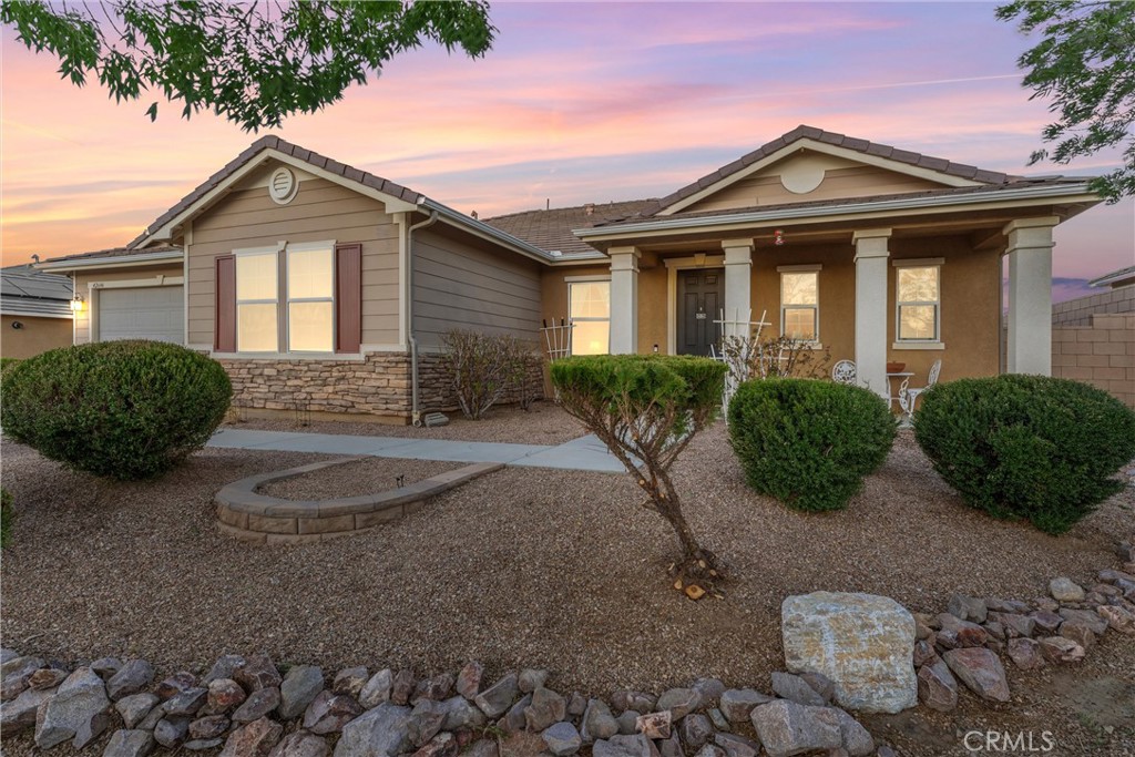 Westside GEM with over 2900 s.f. of open space for living enjoyment! Located in an amazing westside neighborhood, this lovely home sits on an oversized lot 9500+ sf lot with block walls. Offering an expansive living room and a voluminous family room. Stacked with an open kitchen with a breakfast bar, ready for the family to gather. There is a roomy pantry of the kitchen. 4 LARGE bedrooms. Two walk-in closets. This 2012 built home is upgraded with 9-foot ceilings for a spacious feel. Gorgeous tile and carpet flooring. PAID OFF SOLAR. This newer home has been well maintained and is ready for its new owner to love.