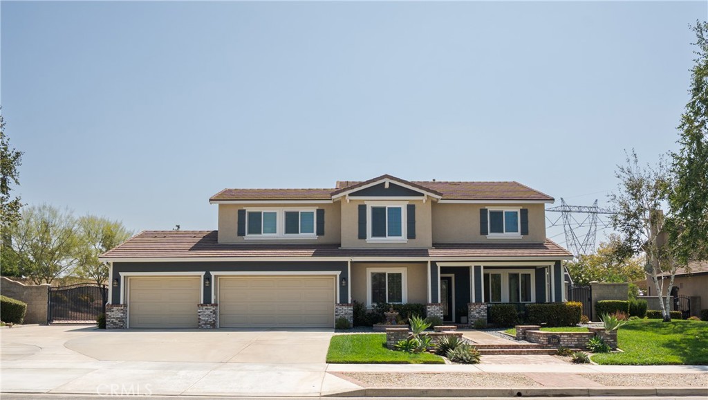 An Elevated Lifestyle Awaits in Rancho Cucamonga’s Sheridan Estates. Welcome to a residence where sophistication meets comfort. This stunning 6-bedroom, 3-bathroom estate is gracefully situated on a half-acre corner lot within the highly regarded Etiwanda School District. Blending modern elegance with thoughtful design, every detail of this home has been crafted for refined living. Inside, you’ll be greeted by expansive living spaces adorned with hardwood-style tile flooring, a chef’s kitchen featuring sleek quartz countertops, designer pendant lighting, fresh cabinetry finishes, and timeless upgrades throughout. The oversized downstairs bedroom provides the perfect retreat for guests or multigenerational living, while the huge walk-in pantry and expansive laundry room off the kitchen provide an abundant amount of storage. A finished garage with epoxy flooring and built-in storage reflects the same attention to detail. Upstairs, the primary suite is a private sanctuary, boasting a custom-fitted walk-in closet and an exclusive balcony with sweeping mountain views—perfect for enjoying morning coffee or evening sunsets. Additional bedrooms, including a permitted loft conversion, offer versatility for family, guests, or a home office. All bathrooms have been reimagined with quartz countertops, designer fixtures, and fresh finishes. The home also includes a whole house fan, perfect for energy efficiency. The backyard transforms daily living into a resort-like experience. Enjoy the sparkling pool and spa with tranquil waterfalls, gather under the expansive patio cover, or cozy up around the fire pit on cool Southern California nights. A spacious shed provides functional storage or creative workspace, while RV parking and fully paid solar add practicality to this elegant lifestyle. Lush garden beds provide room for seasonal blooms or homegrown produce. Ideally located near premier shopping, dining, and entertainment at Victoria Gardens, with convenient freeway access, this home offers the perfect balance of privacy, comfort, and accessibility. Experience the elegance of Sheridan Estates—where your dream home becomes your everyday reality.