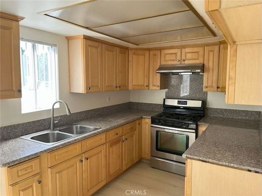 LOOKING FOR YR SWEET HOME! Don’t miss this upgraded, best location townhouse ideally situated in the desirable heart of Monterey Park offering privacy and comfort. while stepping into the entrance, a warm welcoming living room featuring stylish brand-new vinyl flooring, a cozy fireplace, and modern lighting. The open floor plan flows seamlessly into an updated kitchen with granite countertops, free standing range, the thoughtful cabinets is perfect for both everyday cooking and entertaining. The spacious dining area opens directly to the living room ideal for enjoying morning coffee or evening breezes. All bedrooms are extra space. Enjoy the convenience of living close to Barnes Park, the Library, school, banks, supermarkets, and easy access to freeways. With a low HOA fee monthly, which covers water, trash and insurance, this sweet home is both affordable and low maintenance. A must-see to truly appreciate all it has to offer! Additional amenities include an individual laundry room in garage, attached 2-car garage with plenty of extra storage area, direct garage access, only one common wall, this best sweet home is waiting for the new owner with all amenities! do not wait, make this yours!