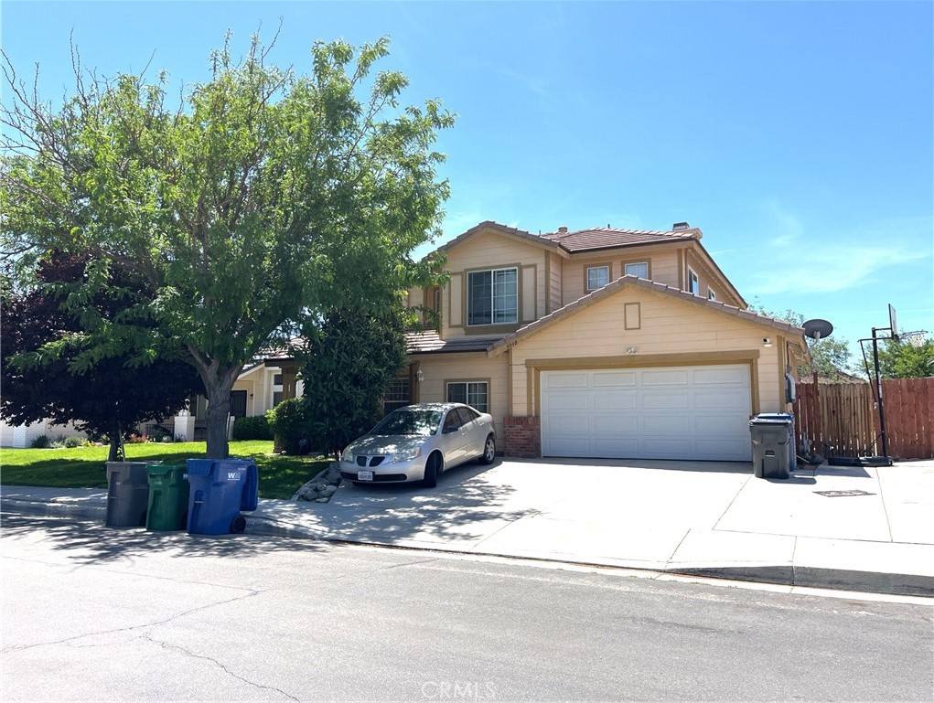 This beautiful two story 5 bedroom, 3 bath home is situated on a cul-de-sac. Gorgeous wood flooring up the staircase, tile floors, ceiling fans with laundry facilities downstairs. A bonus room off the garage makes a great workout room. Solar owned panels too.