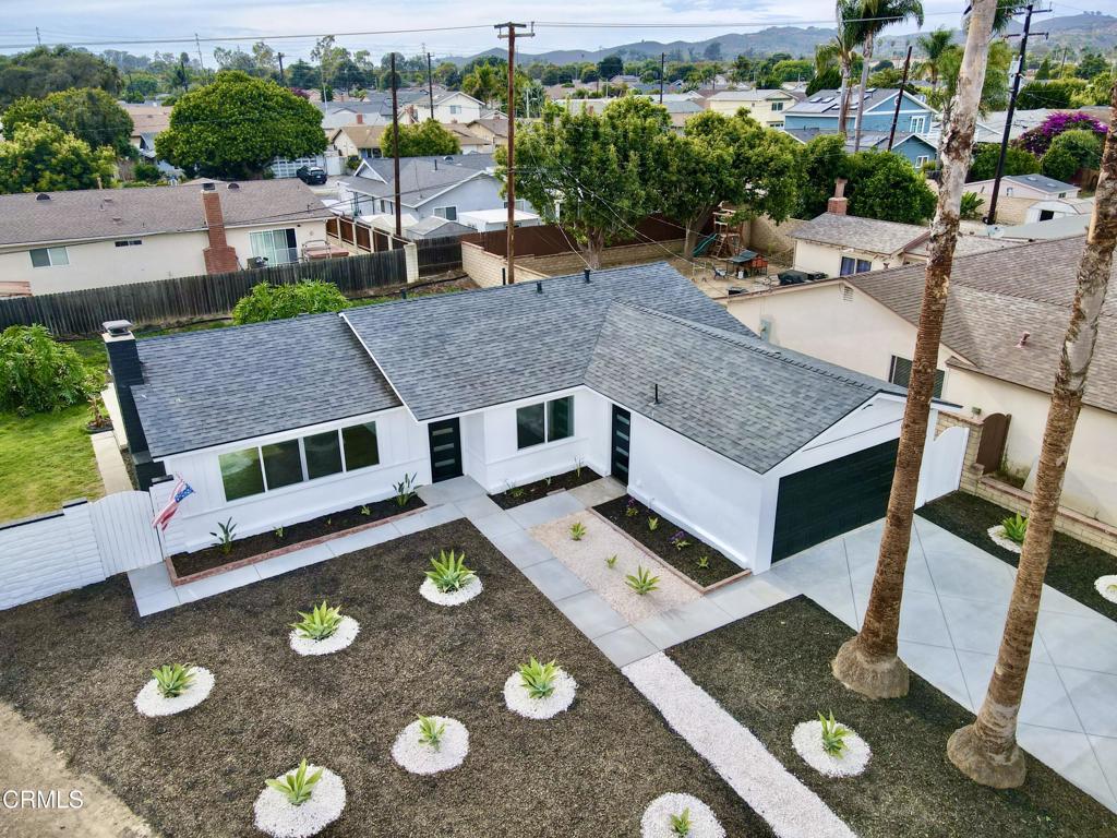 Welcome to this stunningly renovated gem in the heart of the beautiful beach town of Ventura, CA. This open floorplan home has been completely reimagined with modern updates and impeccable attention to detail. Featuring brand-new electrical wiring, copper plumbing, sewer system, roof, kitchen, and heaters, this property is aesthetically stunning; especially the newly poured diamond shaped driveway detail.Step inside to discover a beautifully redone kitchen, complete with top-of-the-line white glass face appliances perfect for the home chef. The open and spacious layout features three well-appointed bedrooms, with an additional bonus room that offers endless possibilities. Whether you need an extra bedroom, home office, or nursery, this versatile space is sure to meet your needs.The expansive, nearly 10,000-square-foot yard is a rare find, providing plenty of room for outdoor living, gardening, or entertaining. Located at the end of a peaceful street, this home offers privacy and tranquility while still being just a short distance from Ventura's vibrant city life.Don't miss the opportunity to make this fully updated home your own! Schedule your showing today!