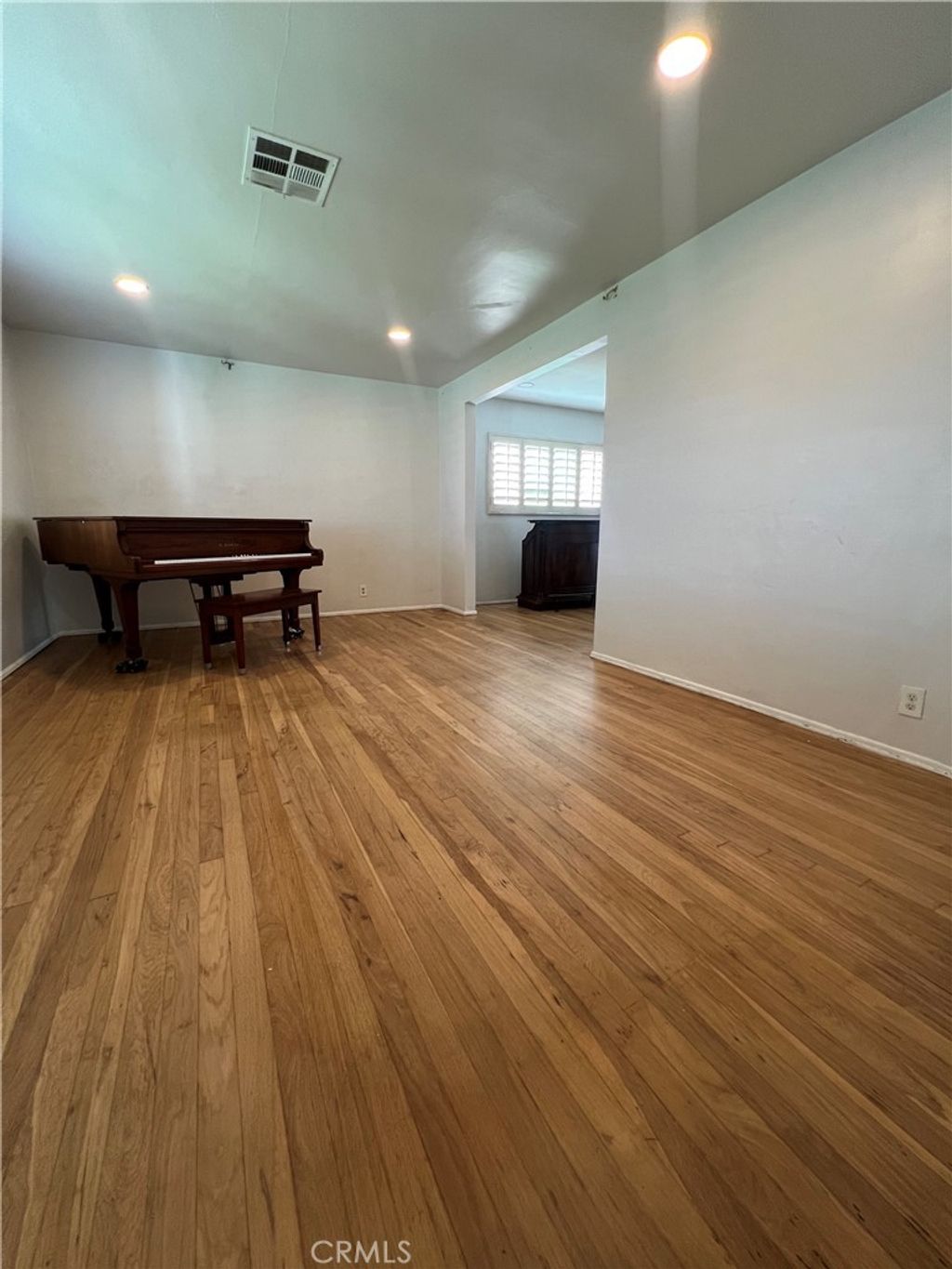 Photo of 11821 Menlo Ave, Los Angeles, CA 90044 (MLS # RS25238400)