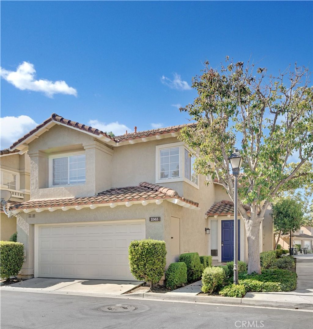 Photo of 2565 Calle Benavente, Tustin, CA 92782 (MLS # OC26052237)