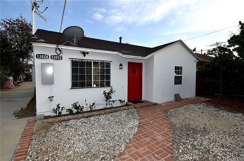 Photo of 13972 Louvre St, Pacoima, CA 91331 (MLS # SR26053921)