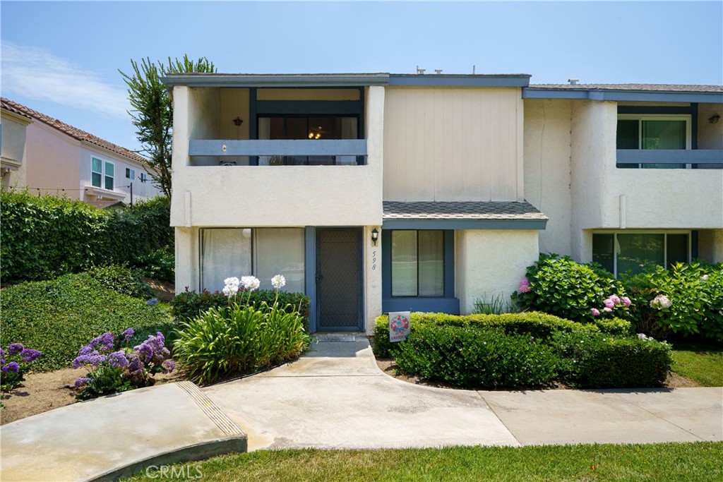 LOCATION...LOCATION...LOCATION...Please enjoy this elegant single level condo in the highly desirable community of Corsican Villas, Brea, where a magnificent homesite offers virtually endless possibilities. Comfortably proportioned at almost 1,500 square feet, this 4 bedroom, 3 bath home shows beautifully. A recently painted interior receives plenty of natural light through its windows. The well-designed open floor plan features the living room and spacious upgraded kitchen with multiple built-ins. The downstairs bedroom is currently used as a den but can easily be converted into the 4th bedroom. Upstairs, the generous master bedroom boasts an en suite bathroom with walk-in shower, while the upper level features 2 additional bedrooms, and a secondary bathroom. The in-unit laundry closet makes this home absolutely complete. ADDITIONAL FEATURES: 2 community pools * walking distance to top-rated Sonora High School in the Fullerton Joint Union High School District * A vibrant shopping and dining scene * close to Brea Mall, and lively downtown area * low HOA * microwave approximately 2025 * Stove and oven approximately 2023 * water heater approximately 2024 * dishwasher and refrigerator approximately 2020 * garage door motor approximately 2024 * Interior painted in 2025 * kitchen updated in 2023 * roof replaced 2017 of the garage by the HOA