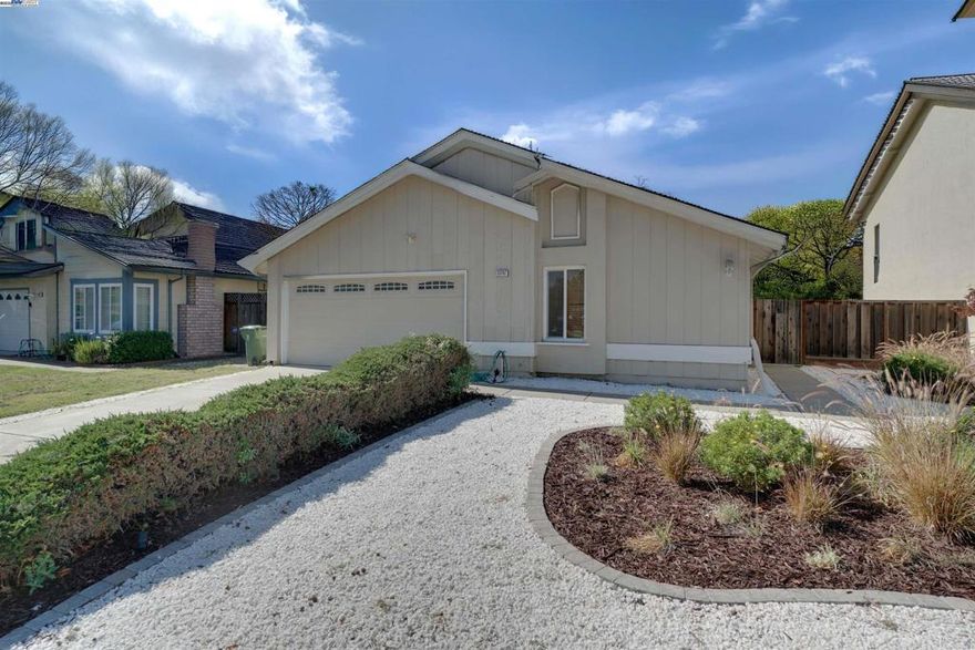 Welcome to this beautifully updated east-north facing 4-bedroom, 2-bath single-family home in the highly sought-after Ardenwood Elementary school area of Fremont! Offering approx. 1,380 sq ft, this bright and open layout is filled with natural light.  The spacious living room with vaulted ceilings creates an inviting setting for formal entertaining or additional gathering space. The warm family room with a cozy fireplace is perfect for relaxing or movie nights. At the center of the home is a charming atrium, adding brightness and a peaceful indoor-outdoor feel. The versatile 4th bedroom also works well as a private home office.  The remodeled kitchen features stainless steel appliances, rich cabinetry, ample counter space, and a bar-height counter ideal for casual dining. The primary suite offers vaulted ceilings, dual sinks, and direct access to the atrium.  Additional highlights include hardwood flooring, fresh interior paint, and a private backyard with mature fruit trees—great for relaxing, gardening, or entertaining. Close to top Ardenwood schools, parks, shopping, and commuter routes.