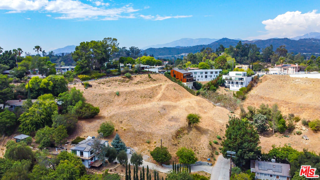 Build your dream home, just above the sparkling streets of Highland Park. This large, partially graded lot is ready for your plans. NOTE: 2 additional, large, adjacent lots are also available - perhaps as a package. This listing is for PARCEL "C" (MLS # 25585123, APN 5485-017-024) - ALSO SEE listings for PARCEL "A" 1480 N. Avenue 57 (MLS # 25585079, APN 5485-017-005) and PARCEL "B" 1476 N. Ave 57 (MLS# 25585103, APN 5485-017-023).
