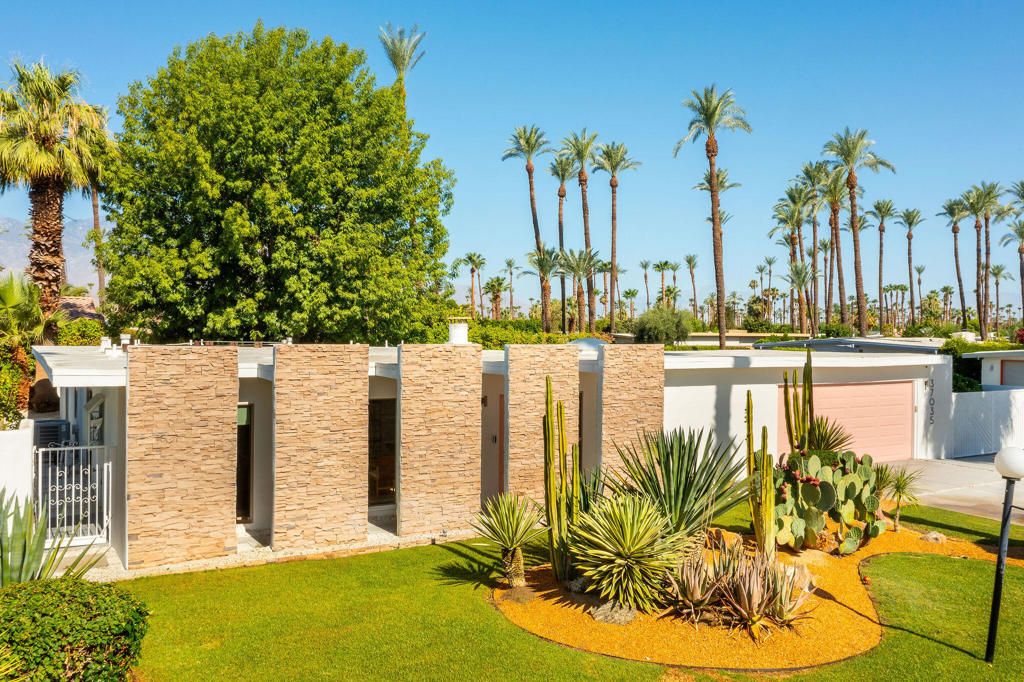 The stars have aligned and right now, Hollywood and mid-century modern history have created an extraordinary opportunity in Rancho Mirage's coveted Tamarisk neighborhood. It's called Green Acres, designed in the late 1950s by Robert Marx, son of Gummo Marx, this home is a rare find that was recently celebrated in the book ''Mod Mirage'' for its architectural significance. The window of opportunity is open. This spectacular home features dual primary suites; both with luxurious spa-like bathrooms. One additional guest room with sliders to pool and gardens beyond. The home's walls of glass seamlessly connect the interior to an exquisitely landscaped backyard with a sparkling swimming pool and breathtaking west-facing views of the mountains. The centerpiece is the original floating lava rock fireplace. Benefiting from recent upgrades, including a newer roof, updated electrical and plumbing systems, and a state-of-the-art saltwater pool with WiFi control, this home is updated for modern living. The peaceful cul-de-sac setting further enhance its appeal, no homeowner's association all present a unique opportunity to blend historical charm with contemporary amenities. Exceptional offering.