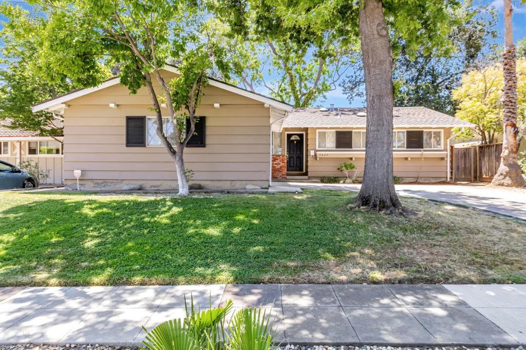 This charming 3-bedroom, 2-bathroom home is perfectly situated for convenience and comfort. Enjoy the ease of a short walk to top-rated Cupertino schools and De Anza College, as well as nearby supermarkets and restaurants. The interior features a classic layout with a separated dining, family, and living room, providing plenty of space for everyone. The home boasts recently refinished hardwood floors and fresh paint throughout. Outside, the spacious backyard offers a private retreat for outdoor activities or relaxation. This home is north-facing and provides easy access to major highways for a seamless commute. Additionally, it's just a short distance from Jollyman Park.
