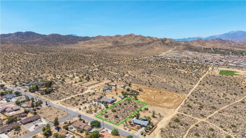 Photo of 8776 Warren Vista Avenue, Yucca Valley, CA 92284 (MLS # JT26185534)
