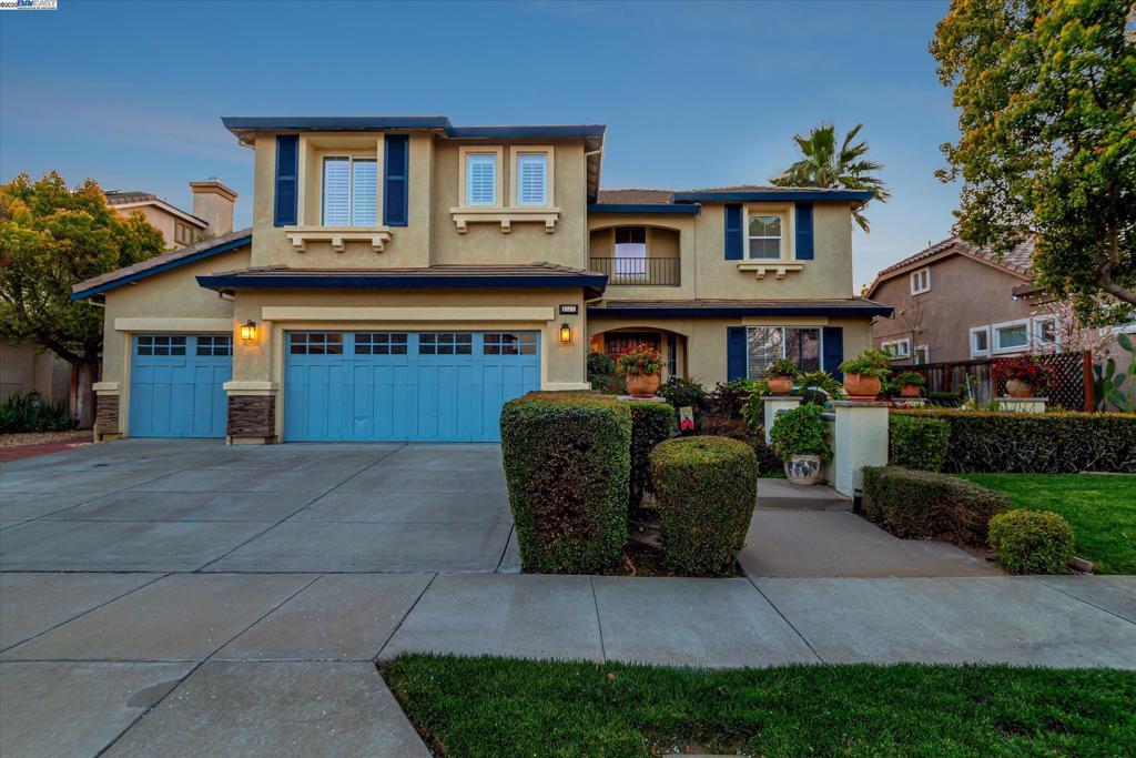 Beautifully maintained Sterling Preserve formal model home featuring a grand entrance, formal living and dining rooms. Spacious kitchen hosts a large breakfast nook, and an island with seating too. A gas range, stainless appliances, pantry, and solid granite counter tops. Downstairs has a bedroom and full bathroom. Separate laundry room. Upstairs has a built-in desk area at staircase landing, three additional bedrooms, and a second family room with a gas fireplace. The Primary bedroom suite features a private sitting area with a fireplace and double doors that lead to a balcony which has a lovely hillside and sunset view.