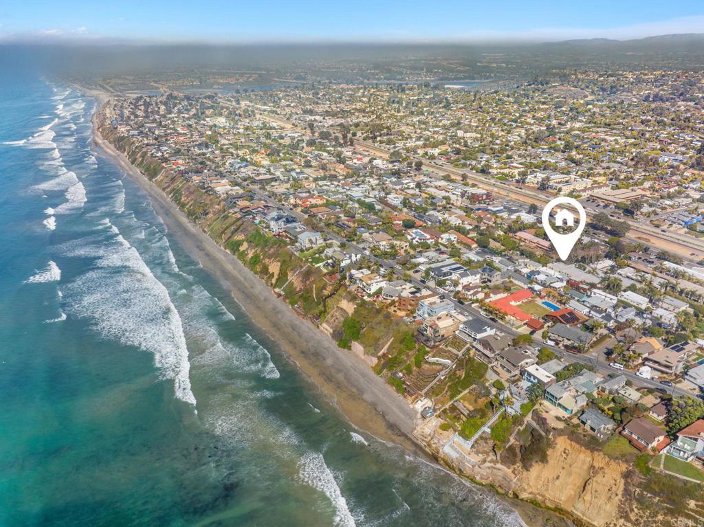 New Improved Price! Welcome to your dream beach condo or the perfect second home escape. This fully remodeled 1-bed, 1-bath condo is move-in ready, so you can start enjoying the coastal lifestyle right away. Nestled west of Hwy 101 in the heart of Leucadia, this charming home is just steps from Beacons Beach and all the fantastic shops, restaurants, and cafes that make this area so special. Inside, you’ll find newly installed wide plank laminate flooring that adds a bright, clean coastal feel throughout. The open kitchen boasts brand new stainless steel appliances, quartz countertops, modern cabinets and sleek hardware, recessed lighting, and a ceiling fan for year-round comfort. The bathroom has been beautifully upgraded with a new double-sink vanity and stylish finishes Fresh paint and new baseboards complete the polished, modern look of the interior. Set in the warm and inviting gated community of Beach Walk, you’ll be surrounded by lush tropical landscaping and have access to amenities, including a sparkling pool, relaxing spa, BBQ area, and convenient laundry facilities. With assigned parking and a low-maintenance lifestyle, you’ll have more time to soak in everything this vibrant neighborhood has to offer. Whether it’s morning strolls to the local farmers market, daily surf sessions, live music at nearby venues, or sunset walks on the sand, every day feels like a getaway. Don’t miss this opportunity to own a slice of paradise in one of the best beach towns in the world! Priced below last sale in the complex-same floor plan/square footage sold for $745K in April & was not just remodeled like this one! HOA is in good standing & Ca inspections have been completed and cleared.