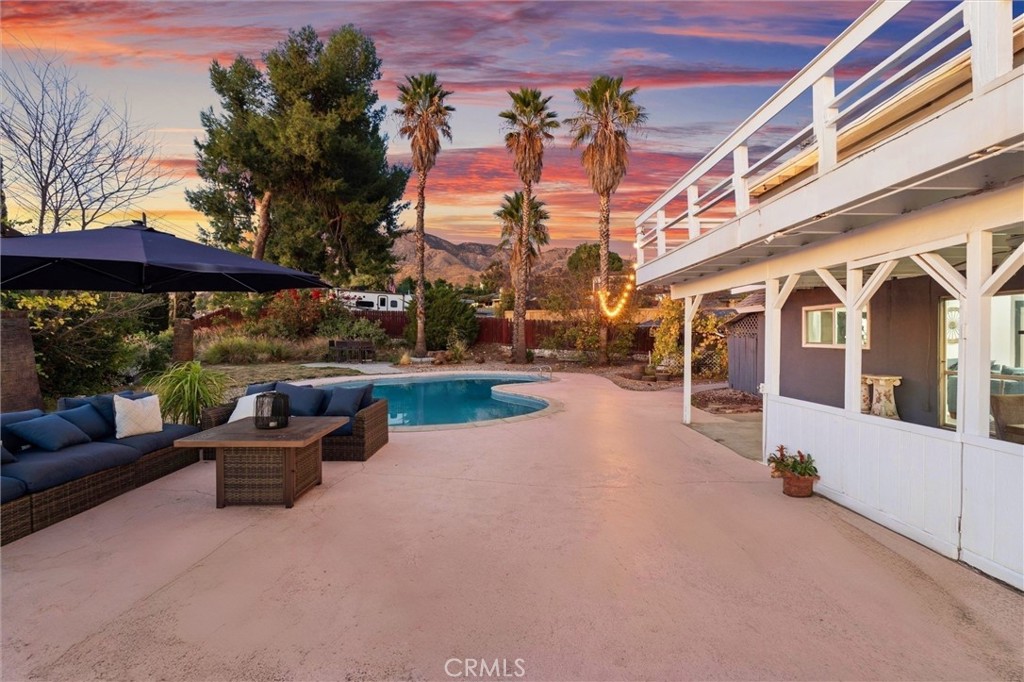 Stunning two-story pool home with breathtaking city and mountain views. This home is truly a private oasis—what’s inside is even more spectacular than it looks outside! Perfect as a family home or short-term rental near Yaamava’ Resort & Casino, where legends like Janet Jackson, Snoop Dogg, Mariah Carey, and Santana have performed. The exterior only hints at the beauty inside, fully remodeled with modern kitchen, copper plumbing, double-pane windows, and open floor plan. Master bedroom features a wide balcony for entertaining, especially on the 4th of July. Expansive backyard with pool and small casita for versatile use. Located in the desirable Small Canyon community near top schools.
COME ON IN AND LOOK FOR YOURSELF!