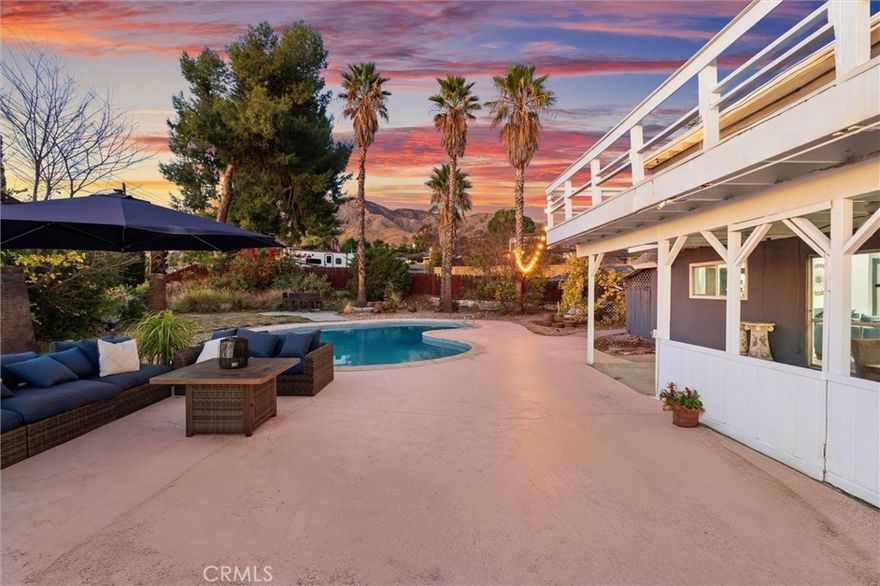 Stunning two-story pool home with breathtaking city and mountain views.  This home is truly a private oasis—what’s inside is even more spectacular than it looks outside!  Perfect as a family home or short-term rental near Yaamava’ Resort & Casino, where legends like Janet Jackson, Snoop Dogg, Mariah Carey, and Santana have performed. The exterior only hints at the beauty inside, fully remodeled with modern kitchen, copper plumbing, double-pane windows, and open floor plan. Master bedroom features a wide balcony for entertaining, especially on the 4th of July.  Expansive backyard with pool and small casita for versatile use. Located in the desirable Small Canyon community near top schools.

COME ON IN AND LOOK FOR YOURSELF!