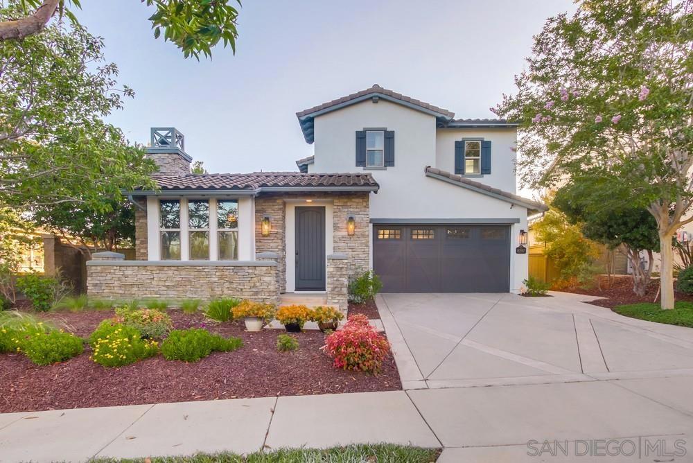 HIGHLY UPGRADED LUXURY Del Sur home with FANTASTIC location, yard, and floor plan! Wide plank Mediterranean Varazze French Oak floors, Calacatta Nobel Quartz counters, West Elm Chandeliers, rods & curtains, updated LED lighting, and that indoor/outdoor living that Del Sur is known for. Recent renovation extended the kitchen island, added a large farmhouse apron sink with gold faucet and hardware, scalloped tile backsplash, textured wallpaper, roman shades, high end ceiling fans, and more. Storage and linen closets... throughout; built in cabinetry and overhead storage in the garage provide ample room for personal items. Use the versatile downstairs room with barn doors and fireplace as an office, living room, or optional bedroom. Large great room similarly has versatile configuration, with media niche and side space with fireplace. Primary bedroom with ensuite primary bathroom and large walk-in closet and 3 additional bedrooms upstairs. Laundry room with butcher block shelving, dual vanity bathroom with shower tub, and plush, upgraded carpet. Large yard with Southwest exposure, grass, flagstone, fruit trees, beautiful succulents, water feature, and greenery, and vegetable garden. 2 gated side yards, one with a separate area with storage shed. Curb appeal with oversized driveway, newly painted exterior, and greenery. Location can't be beat! Steps to the Haaland Glen park & pool, access to all 14 parks, 11 solar heated pools, & events exclusively for Del Sur residents, top Poway Unified Schools.
