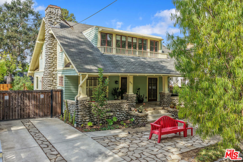 Built in 1907 by Charles Gripton as his own residence, this distinguished Arts and Craftsstyle Craftsman in Pasadena's Madison Heights Landmark District blends timeless architectural character with thoughtful modern updates. Set on a quiet, tree-lined block of Hudson Avenue, the home greets you with its signature river rock columns, broad front porch, and mature, drought-tolerant landscaping, a classic expression of early Pasadena design.Offering approximately 2,278 square feet, the home features four bedrooms and three baths, with three bedrooms upstairs and a flexible office or den on the main level. Inside, original wood floors, French doors, and built-in cabinetry reflect the home's heritage, while abundant natural light fills every generously proportioned room. The living room centers on a brick fireplace framed by custom shelving, flowing easily into a formal dining room with built-in sideboard and garden views.The beautifully renovated kitchen is a showstopper: bright, spacious, and impeccably finished with quartz countertops, high-end stainless steel appliances, custom white cabinetry, and striking pendant lighting. It's a perfect gathering space that marries vintage character with modern functionality.Outdoor spaces invite easy relaxation and entertaining, from the wide front porch shaded by mature trees to the brick patio and open yard at the rear. A long gated driveway and parking space provide practicality to match the home's grace.Moments from Lake Avenue's cafs, Erewhon, Trader Joe's, and neighborhood dining, this residence offers the best of Pasadena living with historic character, quiet surroundings, and walkable convenience.