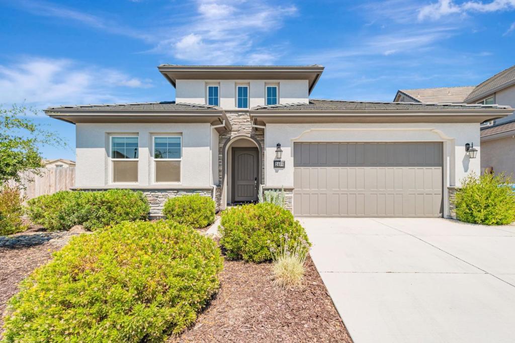 You will love this 2-YEAR OLD HOME located in a corner and huge lot nestled in a new community in the vibrant city of Manteca. Enjoy your backyard oasis with its low-maintenance landscaping, covered patio and a putting green. When you enter the house, you will be greeted with an open floorplan, durable and waterproof luxury vinyl flooring and a gorgeous kitchen. The kitchen is a chef's delight, featuring a gas cooktop, quartz countertops, a large island with sink, stainless-steel appliances, pantry, under cabinet lighting and white cabinets. The primary bedroom features a walk-in closet, dual sinks in the bathroom and a sliding barn door. The house has central air/heating, ceiling fans, owned solar, tankless water heater and has 2 more bedrooms. Located for convenience and lifestyle, enjoy easy access to the freeways, shopping and dining! Perfectly situated right across a beautiful park and playground! The property also includes an inside laundry room for convenience. Don't miss the opportunity to make this beautiful home yours!