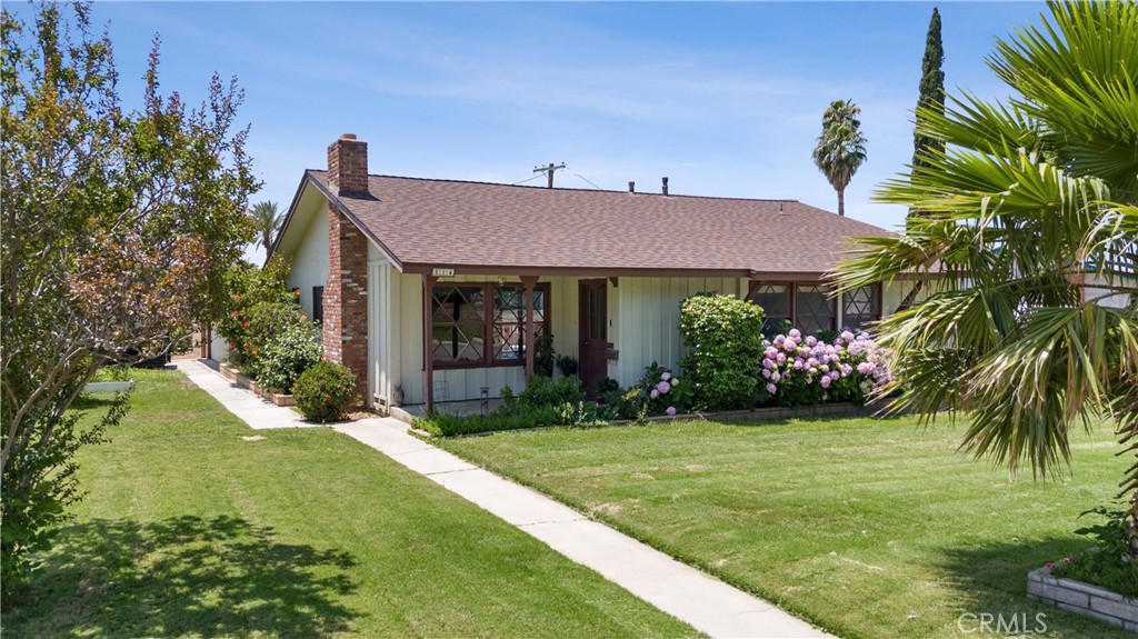 This charming single-story home at 514 Massachusetts Ave in Riverside offers classic mid-century appeal on a spacious 8,276 sq ft corner lot. With 3 bedrooms and 2 bathrooms across approximately 1,420 sq ft, the home features original hardwood floors, a brick fireplace, and vintage diamond-pane windows that add warmth and character. The bright living and dining areas flow seamlessly into a spacious kitchen equipped with oak cabinets, ample counter space, and views of the backyard—perfect for family living or entertaining.
Recent upgrades include refinished hardwood floors, central HVAC, and a newly plastered pool, making the outdoor space ideal for summer relaxation. A detached garage offers potential for an ADU conversion, providing added flexibility for extended family or rental income. Located just minutes from UC Riverside, parks, trails, and major freeways, this property is ideal for families, university professionals, or investors looking for a well-located and versatile home with lasting charm.