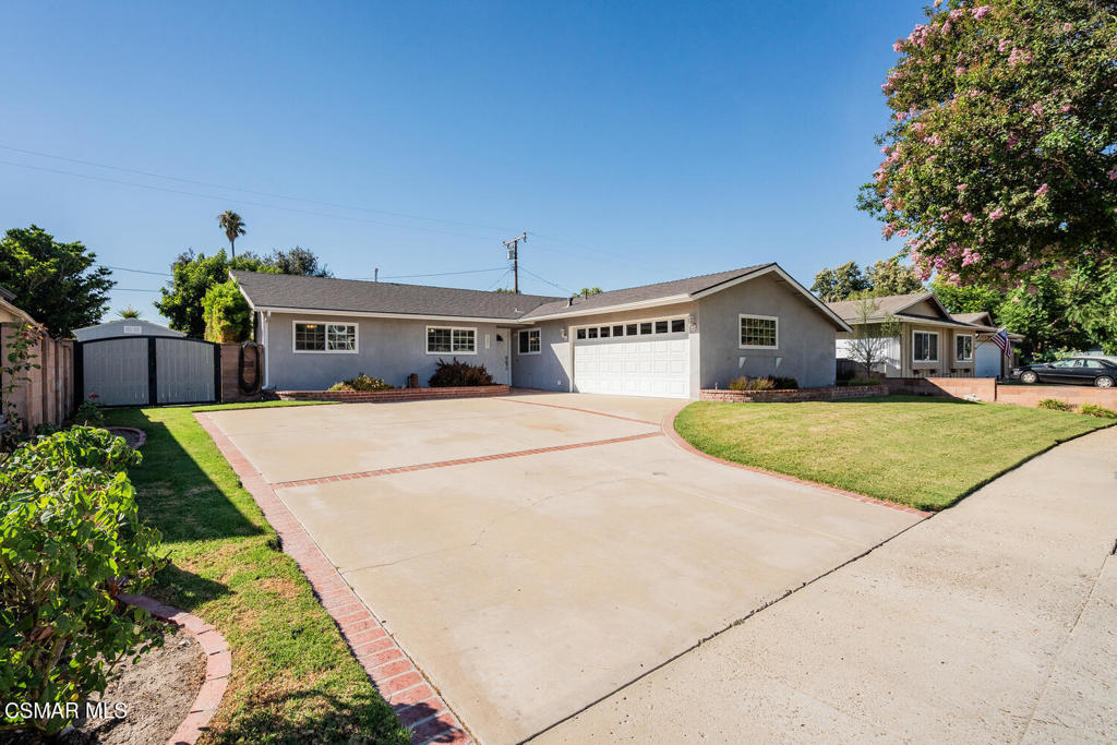 Available now! This beautifully remodeled single-story home is situated on a quiet cul-de-sac in the heart of Simi Valley, just minutes from shopping, dining, and more. Featuring three spacious bedrooms and two updated bathrooms and 1,328 sqft of living space, this light and bright home showcases wood-like flooring and recessed lighting throughout. The large gourmet kitchen is equipped with cherry wood cabinets, granite countertops, a center island, stainless steel appliances, and custom pendant lighting, and it opens to a generous dining area with sliding doors leading to a covered patio and side yard. The family room offers a custom stacked stone fireplace and access to a private, landscaped backyard with mature greenery, a grassy area, and an additional covered patio. Additional highlights include RV parking, an oversized driveway, a two-car garage, and recent upgrades such as Milgard windows and doors, newer AC, furnace, water heater, and roof. Washer, dryer, and refrigerator are included.