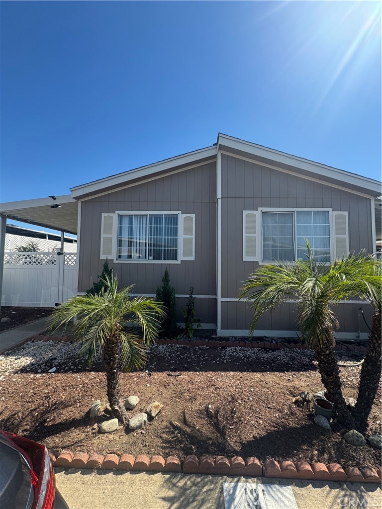 This beautifully maintained mobile home features three spacious bedrooms and two bathrooms, and it is in excellent condition and move-in ready. Located in a Well-Kept community, residents can enjoy amenities such as a refreshing swimming pool and inviting community facilities. The home is situated in a prime area with convenient access to the 10, 60, and Freeways, as well as nearby shopping Centers, dining, and entertainment.