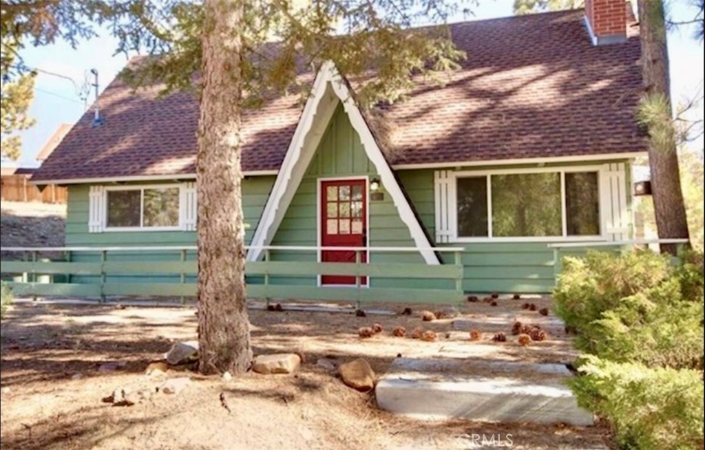 Charming Mountain-Modern Cabin in Big Bear Lake
This beautifully maintained cabin is a tasteful blend of mountain charm and modern comfort. The open-concept living area features vaulted ceilings, wood flooring, a ceiling fan, and large windows that fill the space with natural light. Cozy up by the wood-burning fireplace on chilly mountain nights.
The kitchen is well-equipped and functional, with ample counter space and windows that bring in the serene outdoors. The home includes two comfortable bedrooms and one nicely updated bathroom with a tub on the main level.
Upstairs, the open loft offers additional sleeping and recreation space with two full beds, a TV, and a foosball table — perfect guests or office.
Outside, you’ll find an inviting front porch with seating and a cheerful red door that adds a pop of personality. The spacious driveway accommodates 1–3 vehicles with easy access and minimal steps to the entrance.
After a day of hiking, skiing, or exploring, unwind under the stars in the luxurious jacuzzi — your mountain retreat awaits.
