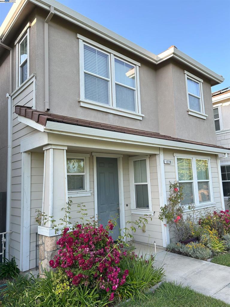 This property is move-in ready and features a solar system, an alarm system, gas appliances, stone counter-tops, and upgraded lighting. There is ample on street parking along with a two-car garage. The complex features a large fenced in recreation area directly across from the unit.