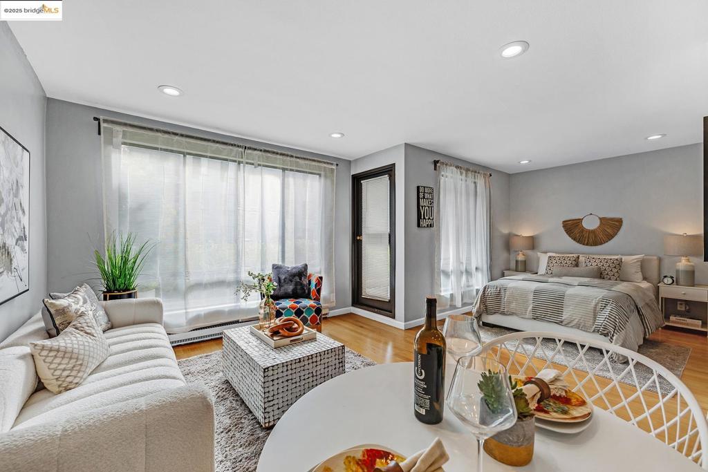 Discover sophisticated living in this chic and thoughtfully designed home in Emeryville. This cozy space is efficiently utilized, featuring an updated kitchen and bathroom, complemented by a smooth ceiling (No popcorn ceiling) with recessed lighting. The smart layout maximizes both functionality and comfort, while its southwest-facing orientation ensures an abundance of warm afternoon sunlight. Enjoy the private patio with direct access to the waterfront shoreline, perfect for taking in sunset views. The property also includes a storage unit and an assigned parking space within beautifully maintained grounds. Situated in the coveted Watergate community, indulge in resort-style amenities such as multiple swimming pools, tennis courts, spas, and a fitness center. With security, laundry facilities, and EV charging stations, ultimate convenience is at your fingertips. The prime location offers close proximity to San Francisco, Berkeley, and Oakland, with diverse dining and shopping options at Watergate Market, Public Market, Bay Street, Ikea, Trader Joe's, and Berkeley Bowl. Seize the opportunity to own this stunning condo, complete with convenient public transportation options like the 'Emery-Go-Round' to BART, Amtrak, and AC Transit.