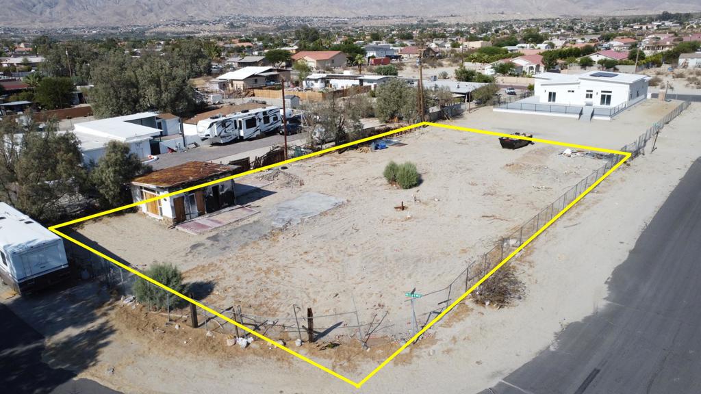 Do not miss the opportunity to own TWO PARCELS together totaling 0.42 acres in desirable Riverside County W-2 zoning, offering an easier development process and flexibility to place a mobile home or build your dream residence. There used to be a house on this property, and a burned structure still stands, meaning you could save significantly on development fees, utility setup, and other costs since a structure is already in place. You can choose to demo the existing structure and start brand new, or explore the possibility of rehabbing it. Located in a rapidly growing neighborhood with plenty of new construction, this property features stunning views of the San Jacinto Mountains and quick freeway access to anywhere in the Coachella Valley in about 20 minutes. Sold together, these parcels present the perfect opportunity to invest, develop, or create your ideal home in a thriving location. Parcels APN #s 657-121-002 and 657-121-005