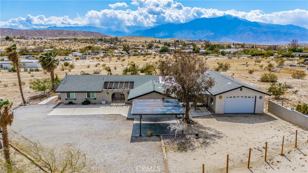Beautiful Desert Hot Springs horse property. Offering 4 bedrooms and 3 bathrooms with 2 car attached garage, RV parking and a (440sqft) guest house. Gated 2.5 Acres of land, home features a bonus (960sqft) workshop/garage and detached car port with 2 storage containers a (40 ft by 8 ft and a 20 ft by 8ft) great for extra storage with electricity. Private swimming pool and spa with large private backyard and patio with panoramic views, great for entertaining. Property is currently being used as an Airbnb. All Appliances plus furniture will be included in the sale. Great investment opportunity and centrally located close to Palm Springs and Joshua Tree.