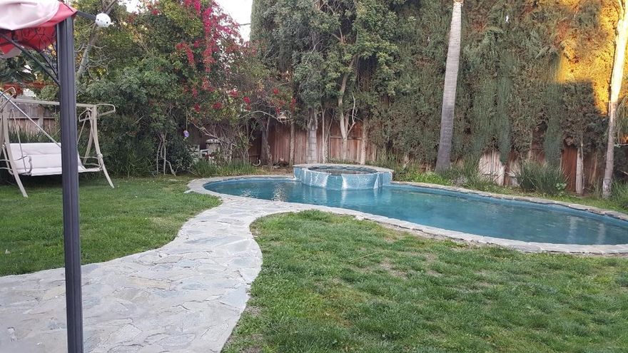 Charming Traditional 3 bdrm/2bath home in Encino, South Ventura. Green Area. Private Garage. Living Room, Den w/Fireplace. Gorgeous Backyard w/ Swimming Pool and Spa. Hardwood floors.Tiled Kitchen, Granite Counter Top, Stove, Dishwasher, Fridge ,Washer, Dryer, Central A/C and Heating, Recessed Lighting. Fresh painting. Master suite and Den overlook manicured private landscaped yard. This is truly a special home. Walking distance to cafeterias, restaurants, shops, groceries. Convince location to 101 freeway, Encino miracle mile, Westfield shopping mall. 3 min drive to big Parks w/ football/baseball, tennis courts. 4 min drive to Sherman Oaks Galleria. 7 min. drive to Studio City, Universal Studios. Walking distance to junior/ middle/high schools. 2 min drive to Pepperdine University campus in Encino.Call or text:Agen