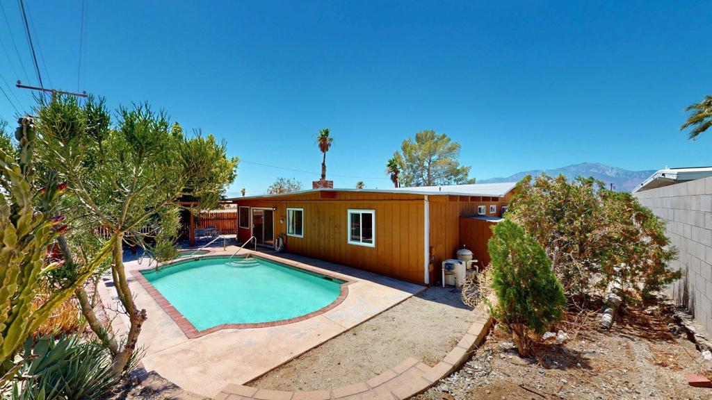 Here's a solid opportunity for first-time buyers or investors--a cosmetic fixer on a quiet corner lot, with no HOA fees. This single-story home offers a practical layout, plus plenty of backyard room to bring your ideas to life.Inside, you'll find multiple bedrooms, including a primary suite with an attached bathroom, and a spacious living area adjacent to the kitchen. Though the finishes are dated, this home has real potential--with the right vision--to become a cozy residence or a short-term rental.The large lot and corner location add flexibility and street presence, plus room for outdoor enhancements. Close to schools, shopping, and local amenities, it's both convenient and affordable.Nearby schools (within about 3 miles) include Julius Corsini Elementary (K-5), Desert Springs Middle (6-8), and Desert Hot Springs High School--all part of Palm Springs Unified School District. Shopping options a short drive away include Vons supermarket, Grocery Outlet, and locally owned boutiques and galleries in Desert Hot Springs and neighboring Palm Desert.This opportunity is ideal for those looking to take on a project with upside. Priced accordingly and offered as-is, this is your chance to create value and build equity.
