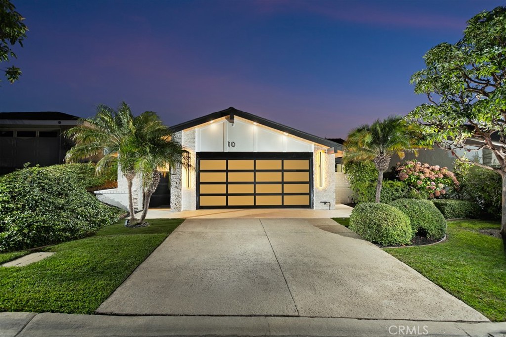 Discover refined coastal living in this beautifully customized Contemporary home located in the exclusive, guard-gated community of Jasmine Creek. Encompassing over 1,900 square feet on a single level, this residence offers privacy, resort-style amenities, and a premier Corona del Mar location just moments from the ocean. Designed for seamless indoor-outdoor living, the home features two spacious bedrooms and two luxurious bathrooms, along with a living room, entertainment room, private dining room, and a gourmet kitchen with breakfast nook. Multiple rooms, including the main suite, open directly to the expansive rear yard and patio, creating the perfect flow for entertaining or relaxing. The chef’s kitchen boasts a Forno 6-burner range, high-end appliances, custom cabinetry, and a pantry with pull-out drawers. The main suite offers a generous walk-in closet and spa-inspired bath with double vanities, a walk-in shower, and a freestanding soaking tub. A secondary suite and charming private patio add to the thoughtful design. Custom stone landscaping, a tranquil waterfall, and walk-up deck enhance the outdoor living experience, while newer appliances, air conditioning, and meticulous finishes complete the home. Move-in ready and crafted for comfort and style, this Jasmine Creek gem presents a rare opportunity to enjoy coastal luxury in one of Corona Del Mar’s most coveted communities.